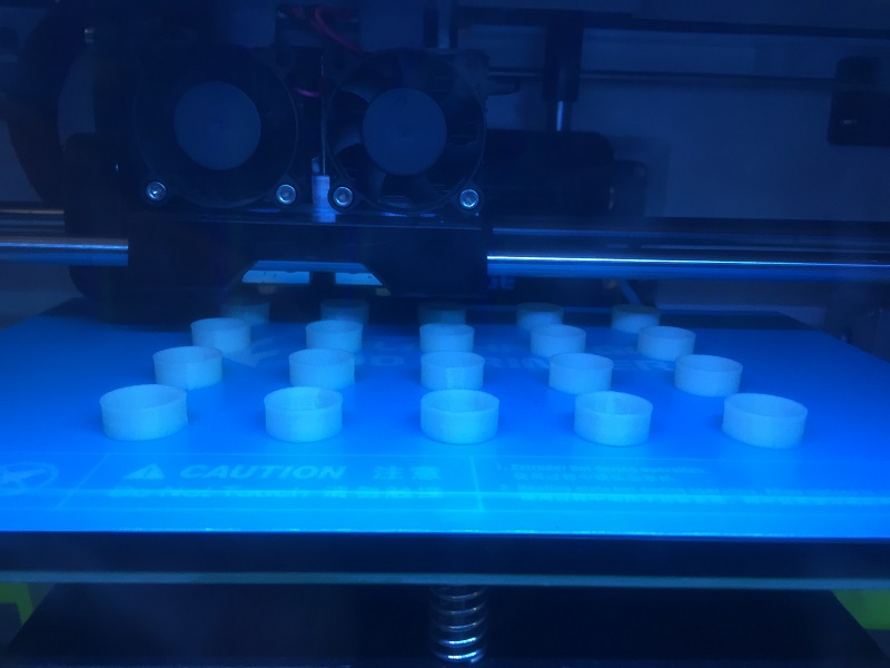 A few of the LED covers being printed. While I can fit 35 on the bed, I found smaller lots are less prone to problems. Here are 20 in the early stages of being printed, and this takes roughly 4 hours.