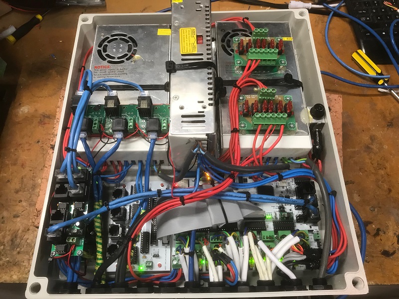 Here you can see the 300w 5V PSU (left) and 2 12V 350w PSU's in the centre and the right. Fuses provide 12V power to the DMX splitters (lower left) and pDMX injection sytem (on the left PSU), along with power injection for the 2 lots of pole/candy cane groups, and 12V and 5V outputs via Anderson plugs. The DMX cables are 3 pin while the pDMX are 4 pin plugs. Lower right is the Falcon F16, and the differential expansion board is to the left of it