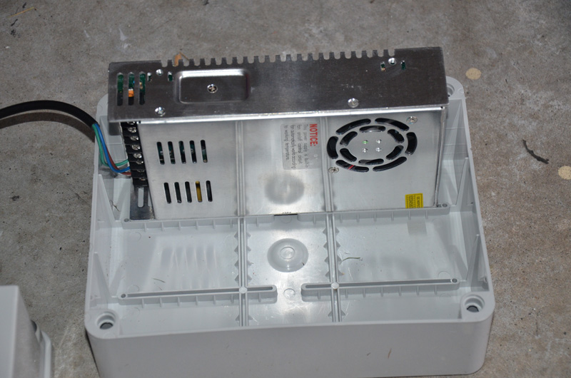 Here we see a standard PSU in place in the box. It takes up about 1/3 the width of the box, and this means you could easily fit 2 of these PSU's on their side like this, and maybe even a small controller like P2 or two, as well as fuses if you design the layout carefully
